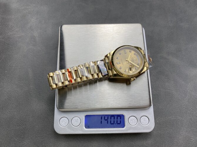 Replica Rolex Day-Date 128238 0008 Fluted Bezel Champagne Diamond Dial 36MM Unisex Watch