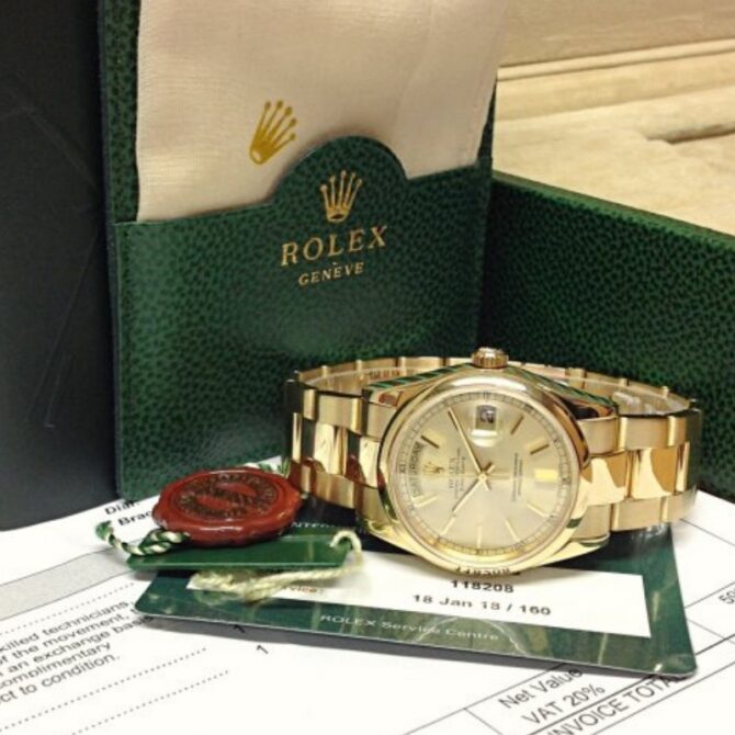Replica Rolex Day-Date 118208 champagne dial with gold indexes 36mm Unisex Watch
