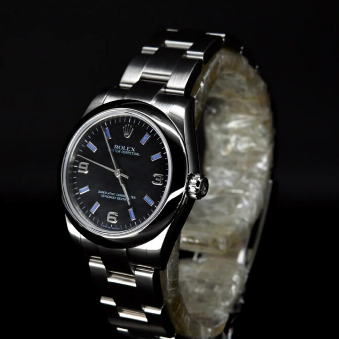 Rolex Oyster Perpetual 177200 Black Dial Blue Baton 31mm Lady Replica Watch