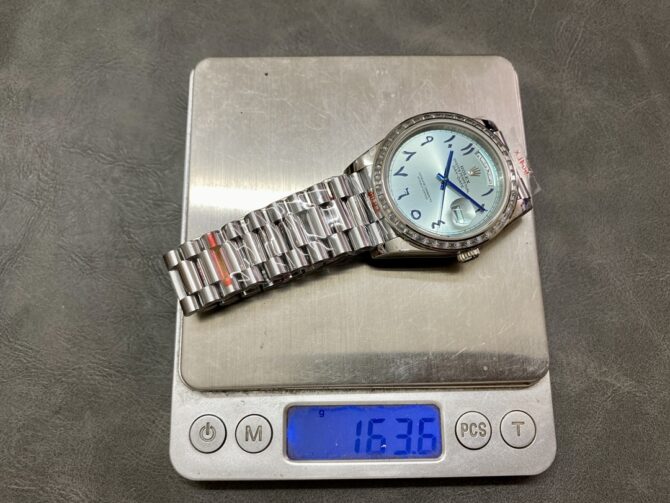Replica Rolex Day-Date 40mm Platinum Ice Blue Arabic Dial Diamond Bezel 228396TBR Men's Watch