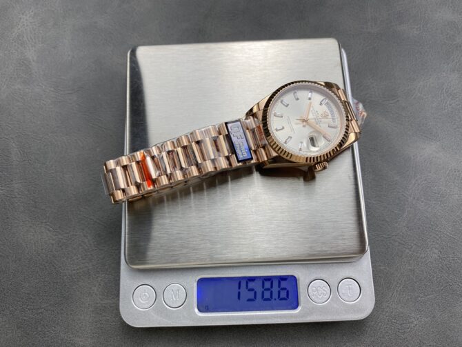 Replica Rolex Day-Date 228235 Sundust Index Dial Fluted Bezel 40mm Mens Watch