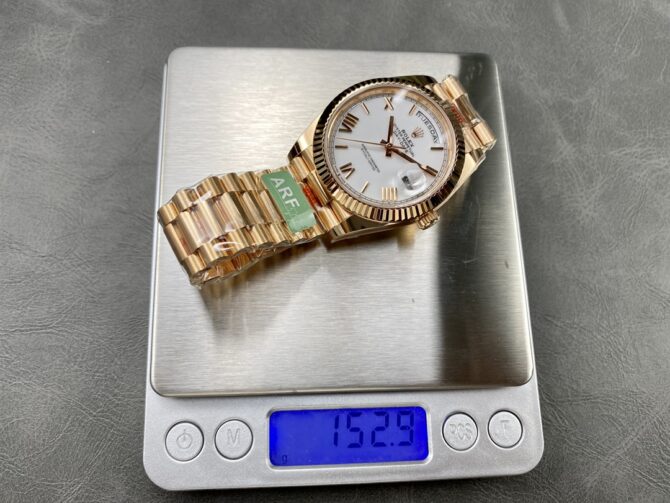 Replica Rolex Day-Date 228235 White Roman Numeral Dial Fluted Bezel 40mm Mens Watch