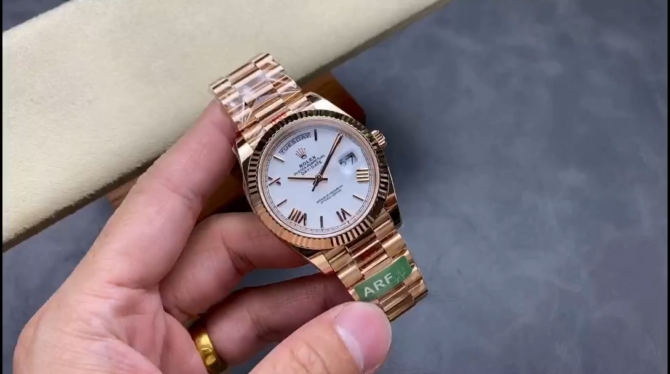 Replica Rolex Day-Date 228235 White Roman Numeral Dial Fluted Bezel 40mm Mens Watch
